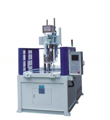 China Máquina de moldagem por injecção vertical rotativa de 55T Fabricantes com diâmetro de parafuso de 35 mm à venda