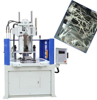 China Máquina de moldagem por injecção de plástico vertical de mesa rotativa de alta produtividade 200T à venda