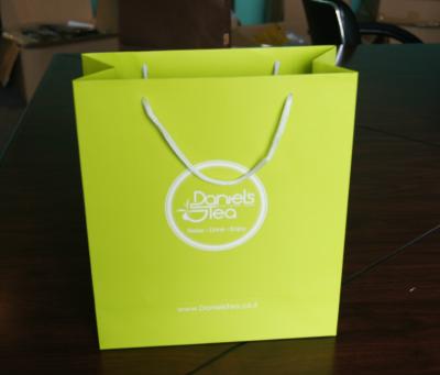 China Custom Designed Green Kraft Paper Bags With Cotton Handle Tea Packaging Bag for sale