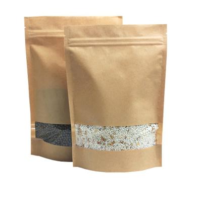 中国 乾燥した食品包装のための Ziplock そして窓が付いているクラフト紙のクリの包装袋を立てて下さい 販売のため