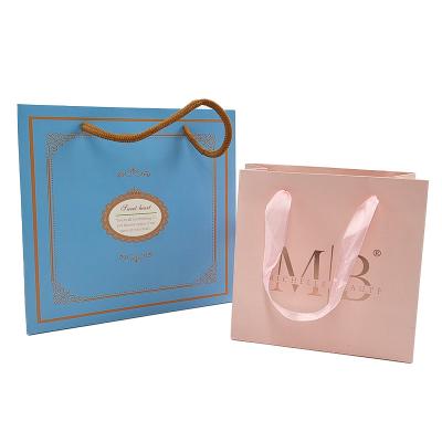 China White Kraft Paper Shopping Clothing Cosmetic Perfume Gift Bag Luxury Handle Custom Logo Printed Paper Bag for Clothes for sale