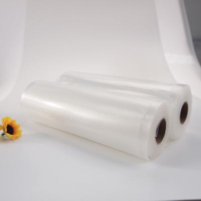 China rollo de nylon grabado en relieve transparente del ahorrador de la comida de los bolsos del sellado caliente del vacío del PE para la fruta en venta