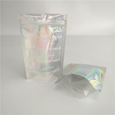 China Stand Up Holographic Bags With Front Clear and Back Holographic Effect for Eyelash Comestic Packaging for sale