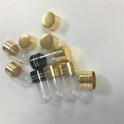 China Material plástico colorido del ABS del arte del grabado del envase de la cápsula del casquillo del metal de las botellas de píldora en venta