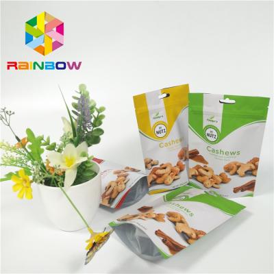 China Foil Stand Up Snack Bag Packaging Zipper Plastic Cashew Nut Pack Custom Printed for sale