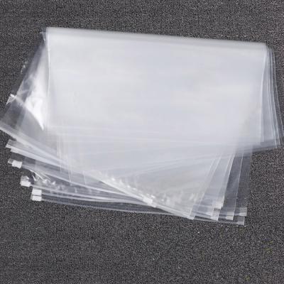 China VMPET CMYK Transparent Garment Zipper Bag PVC CPE Slider Zipper Bags for sale