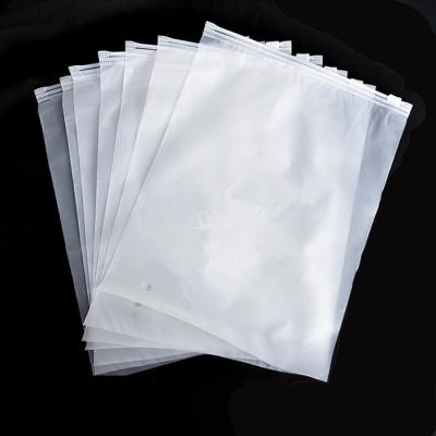 China 30x40cm CMYK Clothes Ziplock Packaging Bag ny 1.5c Plastic Transparent Zipper Bag for sale
