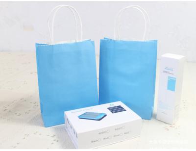 China Beautiful Blue Printing Kraft Paper Bags Medium Size For Shopping for sale