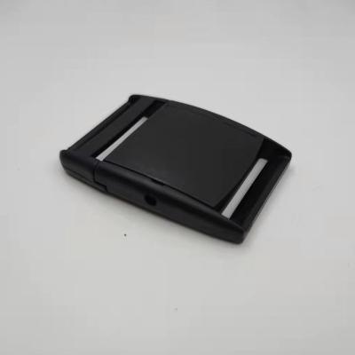 Chine La sécurité de boucle de ceinture d'ODM 35mm d'OEM a adapté la boucle aux besoins du client en plastique d'insertion à vendre