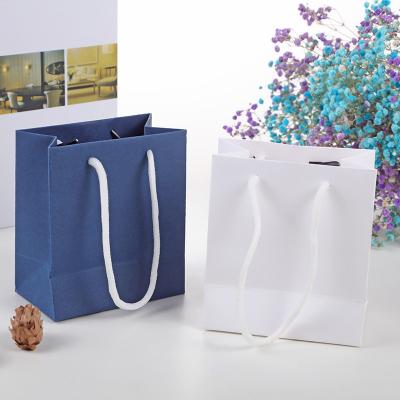 China High Standard Quality Custom Logo Printed Shopping Gift Paper Bag with Handle for sale