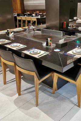 中国 7つの座席誘導加熱の電気Teppanyakiのテーブルのグリルのステンレス鋼および合金鋼 販売のため