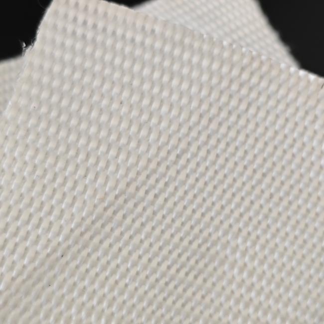 High-strength PET woven geotextile fabric sample showing texture and weave pattern