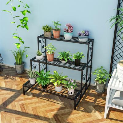 China Iron Garden Plant Display Stand Shelves For Large Flower Pot Rack Display 3 Store Black for sale