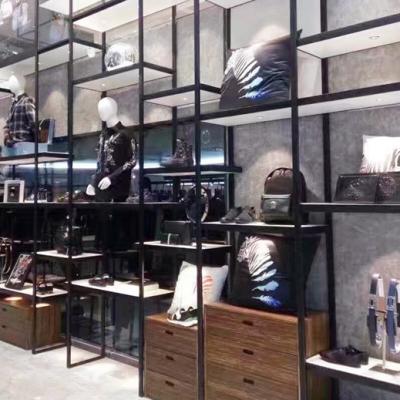 Китай Стеллажи для выставки товаров одежды бутика стены одевают розничный магазин для магазина одеяния продается