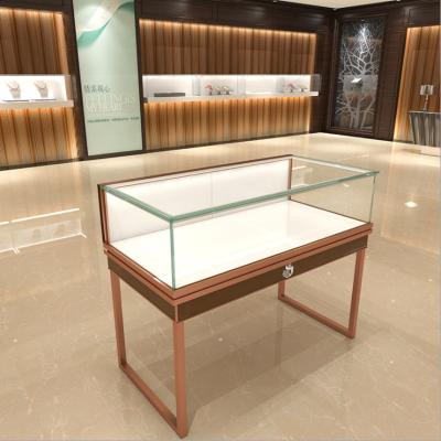 China Lockable Custom Retail Display Cabinets For Jewelry Shop Gold Black Furniture for sale