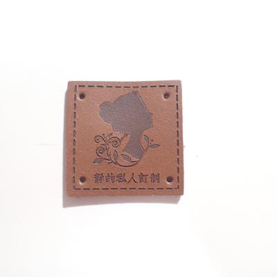 China Debossed Logo Small PU Leather Patches suitable For Hat And Bag for sale