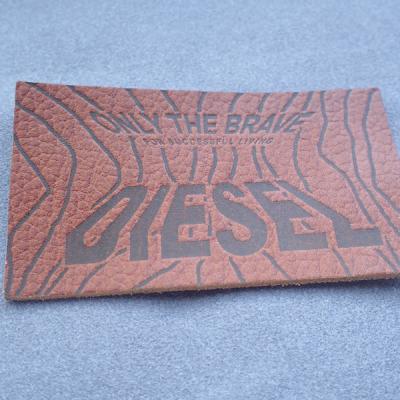 China Brown Rectangle Shape 3D Custom Embossed Labels for sale