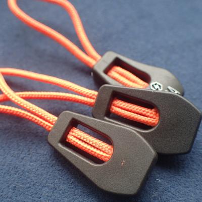 China Durable Embossed Logo PVC Zipper Slider Puller for sale
