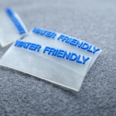 China Transparent 3D Logo PVC Personalized Clothing Labels for sale
