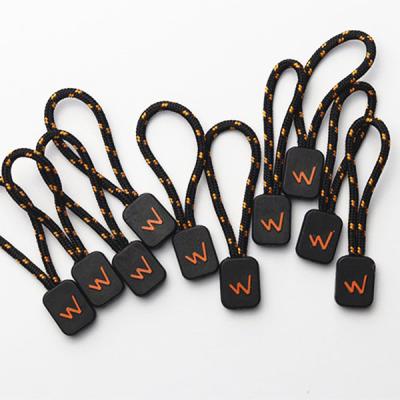 China Embossment Effect ISO Auto Lock Zipper Pull Cord For Clothes for sale