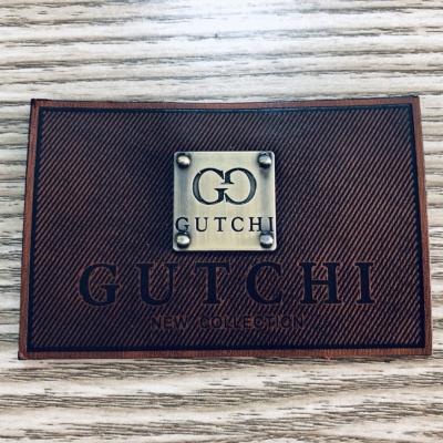 China Eco Friendly custom leather patches Shiny Metal Logo For Cowboy Clothing for sale