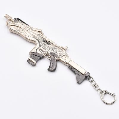 China Ape x game Silver submachine gun Stock Customer customized requirements mini metal gun models keychain 16 cm gift toy for sale