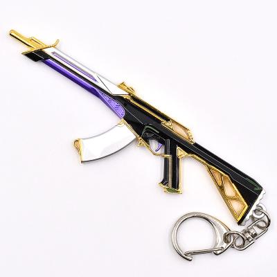 中国 Unisex Metal Gun Keychain Prime Vandal Crafts Gold Color Art Key Chain 販売のため