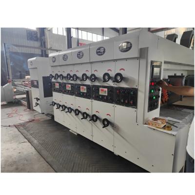 China 1200*960*2200mm Vacuum Transfer Flexo Printing Slotting Die Cutting Carton Machine for sale
