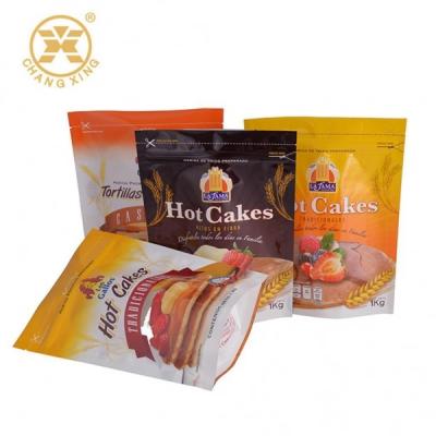 China Stand Up Mini Cake Roll Film Food Packaging Bag Mini Cake Packing Bag Barrier Biodegradable Laminated Bag for sale