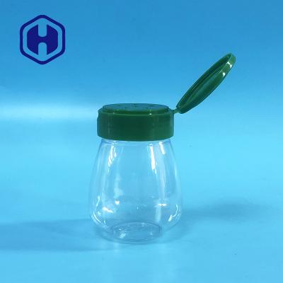 China Small Salt Pepper Round PET Empty Plastic Spice Jar 100ml Flip Top Lids 6 Holes for sale