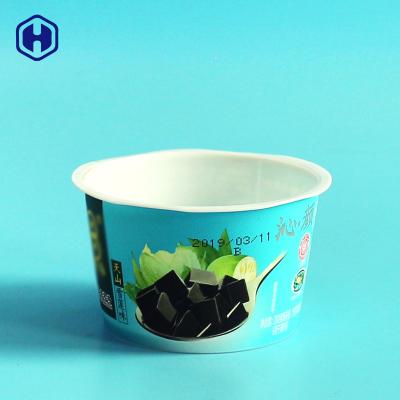 China Copos plásticos pequenos vazios do gelado com sentimento estético da tampa da colher à venda