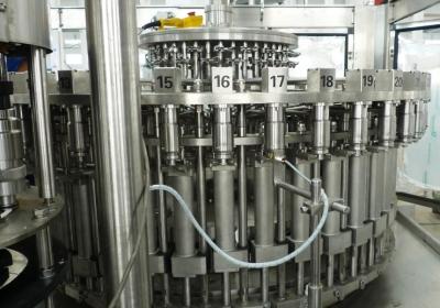 China PET flessen drank vullen Machine omvatten roterende rinser, roterende vuller, Rotary capper Te koop