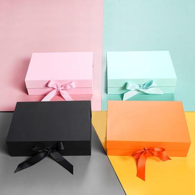 China Cardboard gift box Folding Paper Flat Packing Luxury Magnetic Gift Box with ribbon for clothing and shoes for sale