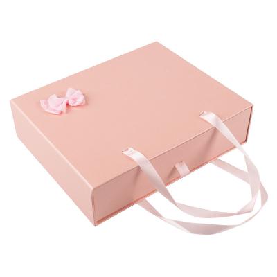 China Custom Pink Fashionable Gift Packaging Box Portable Drawer With Ribbon for sale