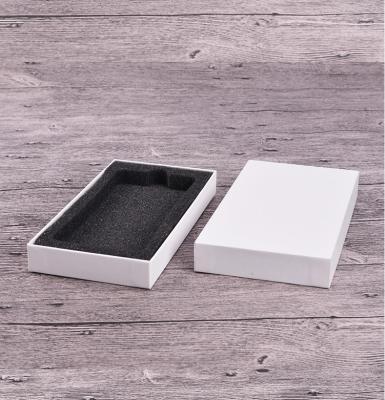 China Custom Black White Mobile Case Packaging Box With Sponge EVA for sale