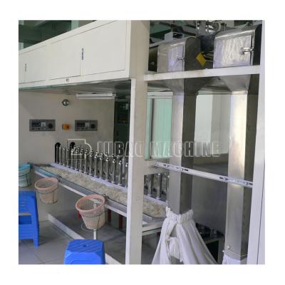 China High Capacity Continuous Dipping Line Condom Electric Test Machine for sale