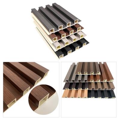 China Interior Waterproof Wood Grain Laminated PVC WPC Wall Panels Designs Decor for sale
