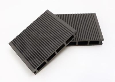 China 3D Embossed Composite Interlocking Tiles Outdoor WPC Flooring Decking for sale