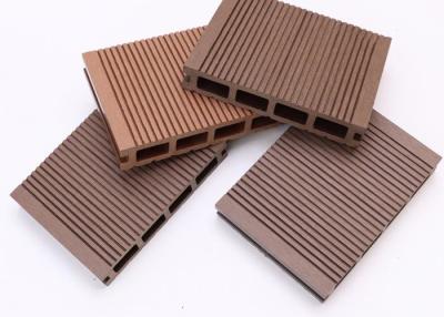 China Interlock Decking 3D Embossing WPC Composite Decking Tiles Plastic Flooring for sale