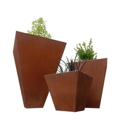 China Polygonal Outdoor Metal Planter Rusted Steel Planter Boxes For Flower for sale