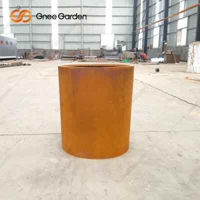China Flower Rusty Finish Round Corten Steel Planters For Garden for sale