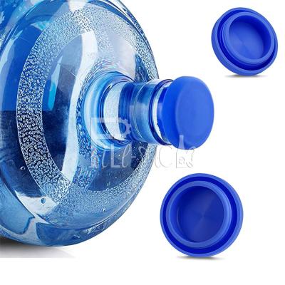China Los casquillos reutilizables del silicón del agua de 5 galones no rematan ninguna cubierta de la tapa del chapoteo para la botella en venta