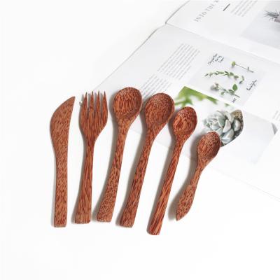 China Coconut Wood Reusable Wooden Utensils Custom Spoon Fork Knife Set for sale