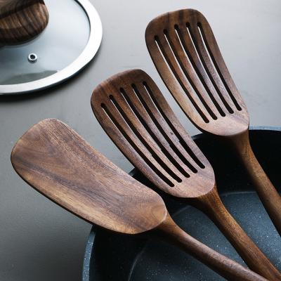 China os utensílios de madeira da cozinha contínua da teca de 33.8cm resistentes ao calor colam não Pan Spatula à venda