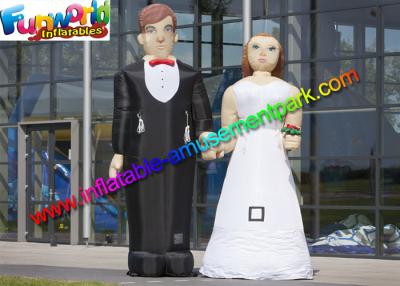 China 210D Oxford Cloth Inflatable Figures Groom And Bride Toys For Wedding for sale