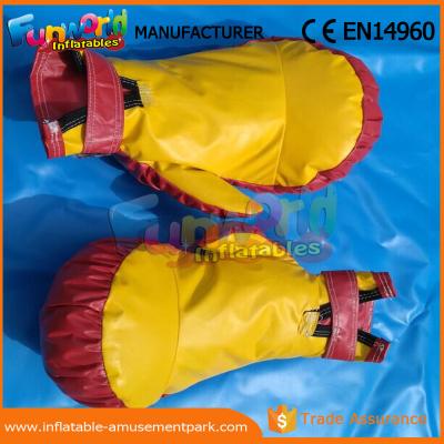 China Giant Inflatable Sports Games Yellow Inflatable Gloves For Boxing Fighting Games for sale