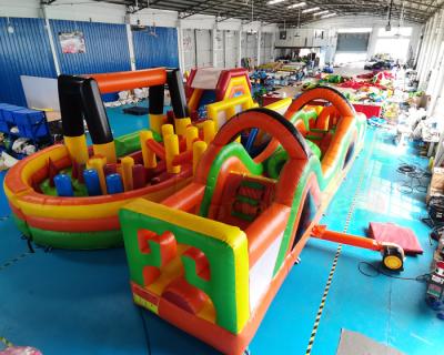China ODM 1000D Inflatables Obstacle Course Kids Bounce House Slide for sale