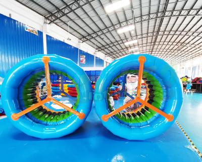 China Commercial Blow Up Walking Rollers Inflatable Water Roller Wheel for sale