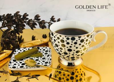 中国 Fine Bone China Spot With Real Gold Design With 9.5cm Square Dish Footed Coffee Mug 販売のため