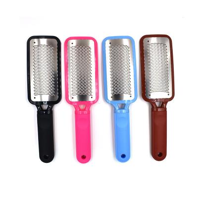 China Feet Pedicure Rasp Remover with Plastic Handle and Stainless Steel Foot File Heel Grater for sale